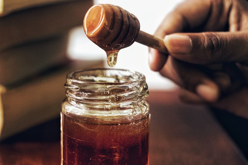 Close up of honey dripping