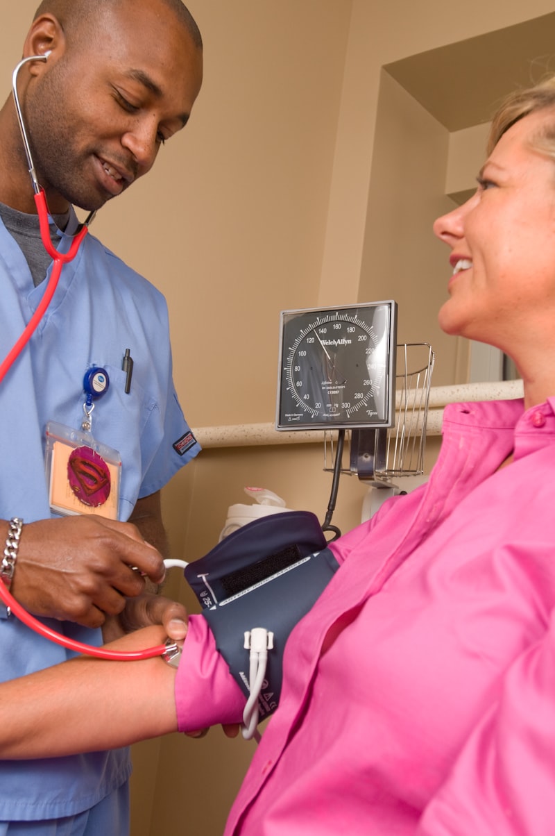 Healthcare clinician reviewing medical history, drug interactions, and clinical pharmacology